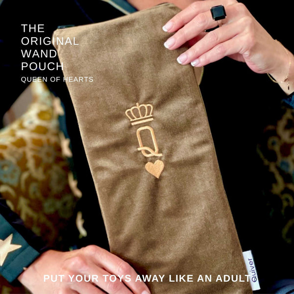 Woman holding the Queen of Hearts Original Wand Pouch to show scale. USA-made storage pouch for wand massagers, charging cords, and personal wellness essentials.