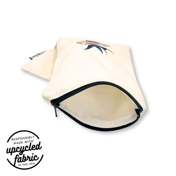Discreet travel case for wellness essentials, lined in white cotton and made in the USA.