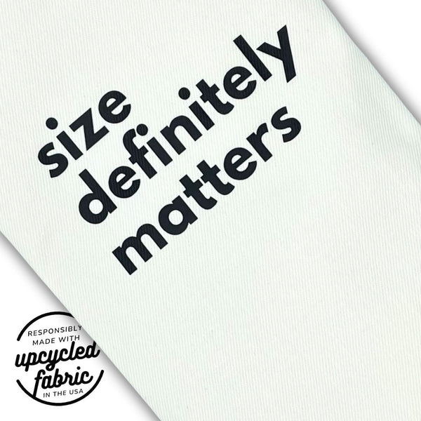 Wand pouch with “Size Definitely Matters” printed in black text close up detail