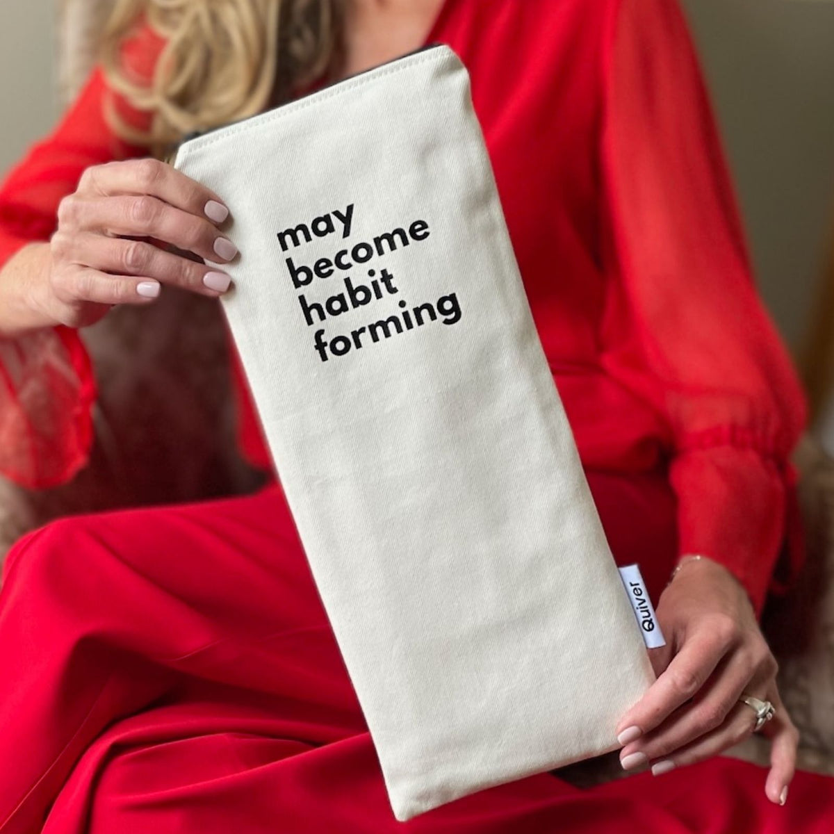 Wand pouch with “Heavy on the Self-Love” text printed on off-white denim.
Discreet, zippered case with cotton lining for wellness accessories, responsibly made in the USA.