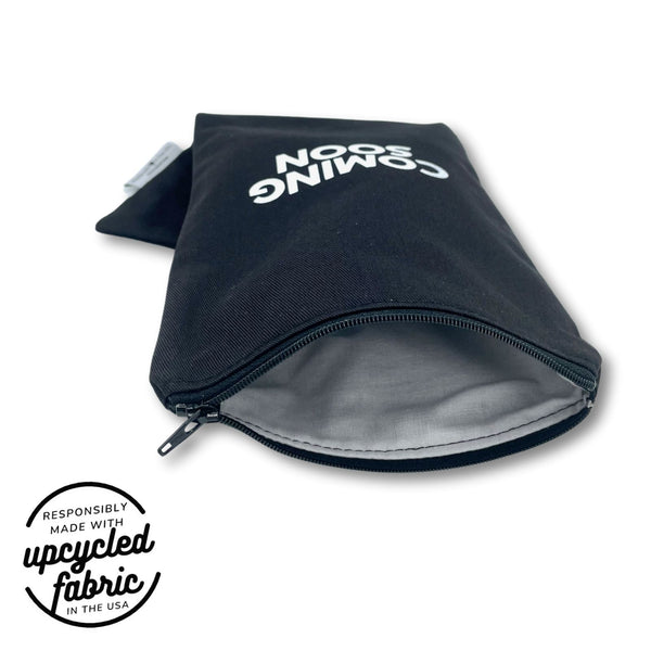 Cotton lining detail for discreet black cotton pouch with glitter text for full-size personal wellness device storage