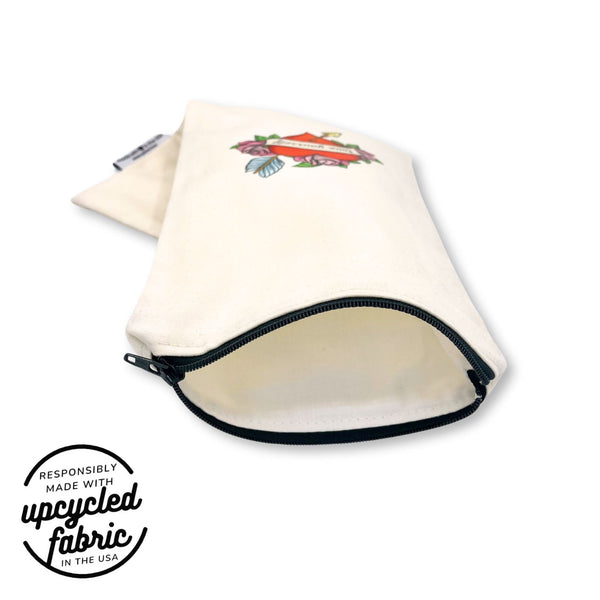 Discreet storage case for handheld wellness devices, lined in white cotton and made in the USA.