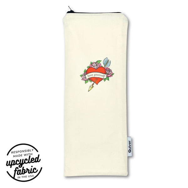Wand pouch with vintage flaming heart tattoo design featureing the words "love yourself" on sueded off-white cotton. grapphic logo reads "responsibly made in usa from reclaimed fabrics"