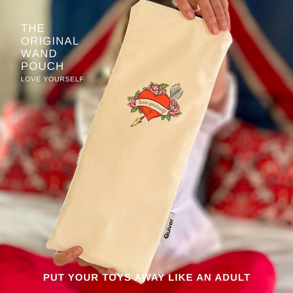 image of model holding quiver.love original wand massager storage bag to illustrate size.  Love yourself version has vintage tattoo art on front of pouch. Text overlay reads "put your toys away like an adult"
