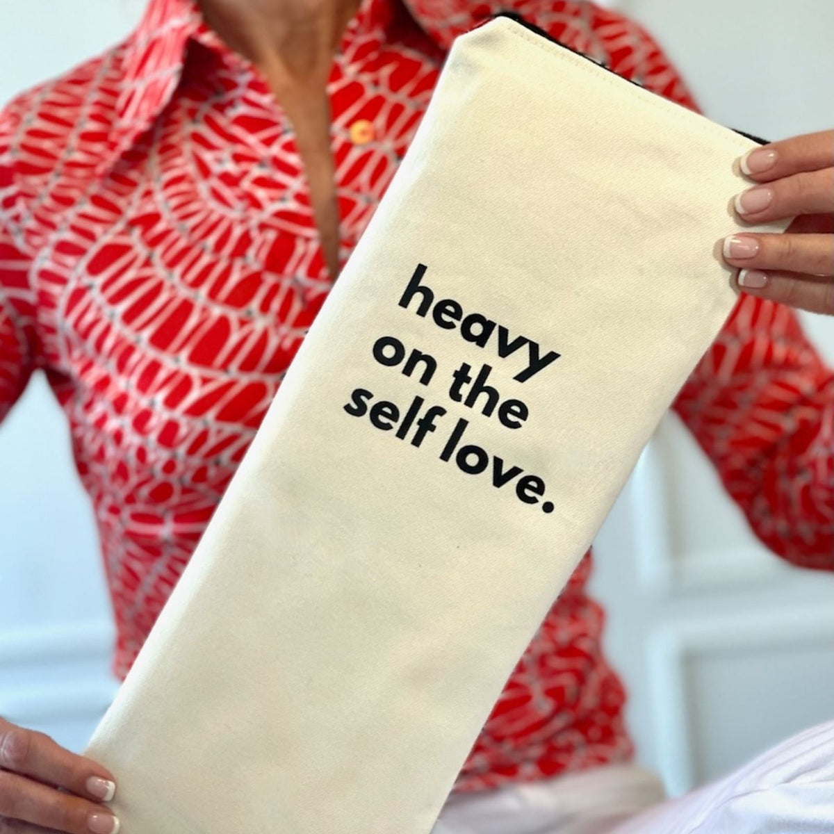 Discreet, zippered case with cotton lining for wellness accessories, made in the USA.