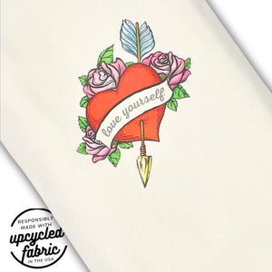 Wand pouch with vintage flaming heart tattoo print on sueded off-white cotton, fabric and decal detail
