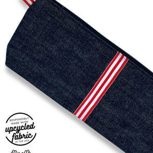 fabric detail of adult toy storage pouch dark midnight denim with red and white ribbon accent , made in USA by Quiver.Love
