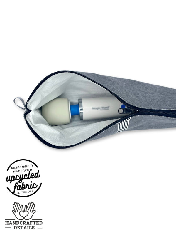 fit detail of wand massager, sex toy storage bag in dark gray denim fabric, shown holding hitachi magic wand