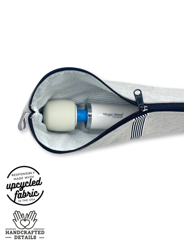 fit detail of wand massager, sex toy storage bag pale denim fabric, shown holding hitachi magic wand